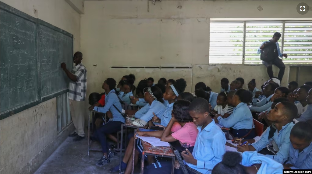 Students attend a math class at the Jean Marie Vincent High School in Port-au-Prince, Haiti, on Thursday, July 25, 2024. (AP Photo/Odelyn Joseph)