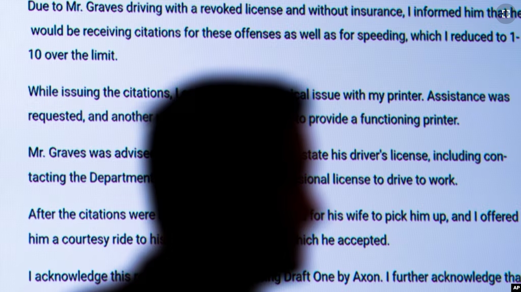 Captain Jason Bussert demonstrates Draft One, an AI powered software that creates police reports from body cam audio, at Oklahoma City police headquarters on Friday, May 31, 2024 in Oklahoma City, Oklahoma. (AP Photo/Nick Oxford)