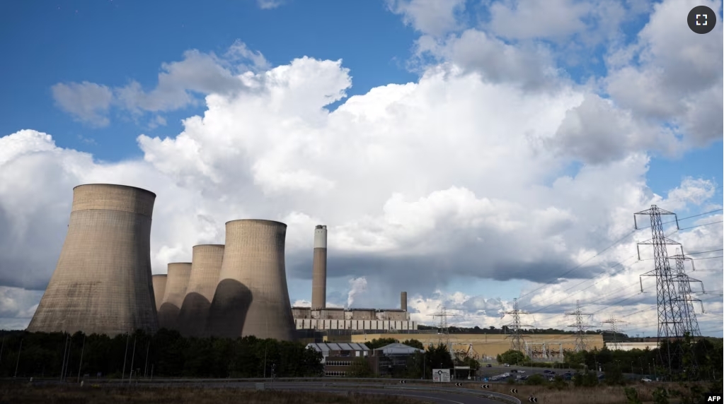 FILE - The Ratcliffe-on-Soar coal-fired power station, which is due to close at the end of the month, is pictured near Nottingham, central England on Sept. 12, 2024.