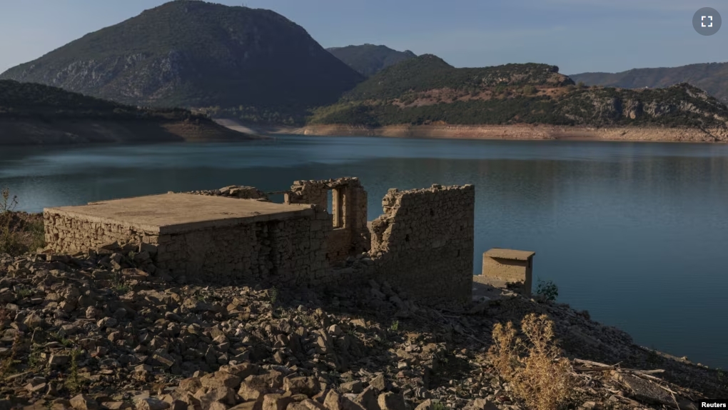 The images shows the reappearing remains of buildings of the village of Kallio, which was intentionally flooded in 1980 to create a reservoir to supply water needs of Greek's capital Athens on September 3, 2024.(REUTERS/Stelios Misinas)