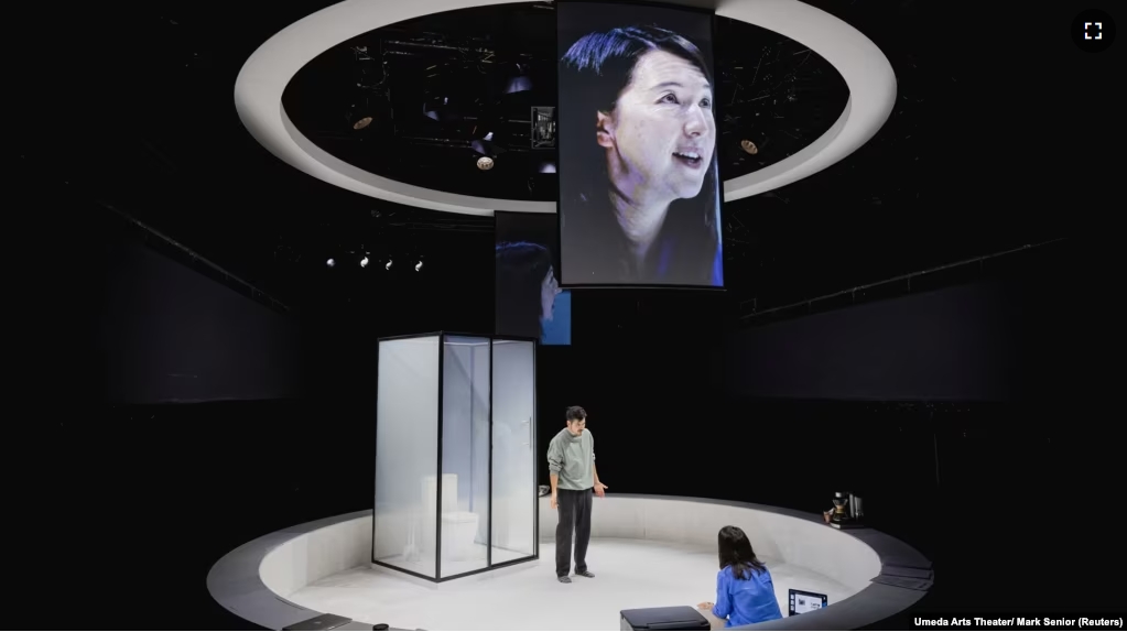 Actors Susan Momoko Hingley and Mark Takeshi Ota perform in the production of "One Small Step" in London, Britain, September 27, 2024. (Umeda Arts Theater/ Mark Senior/Handout via REUTERS)