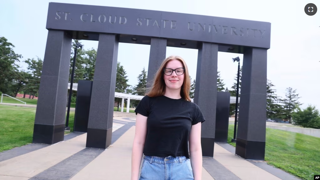 University student Christina Westman poses at St. Cloud State University, Tuesday, July 30, 2024, in St. Cloud, Minn. (AP Photo/Adam Bettcher)