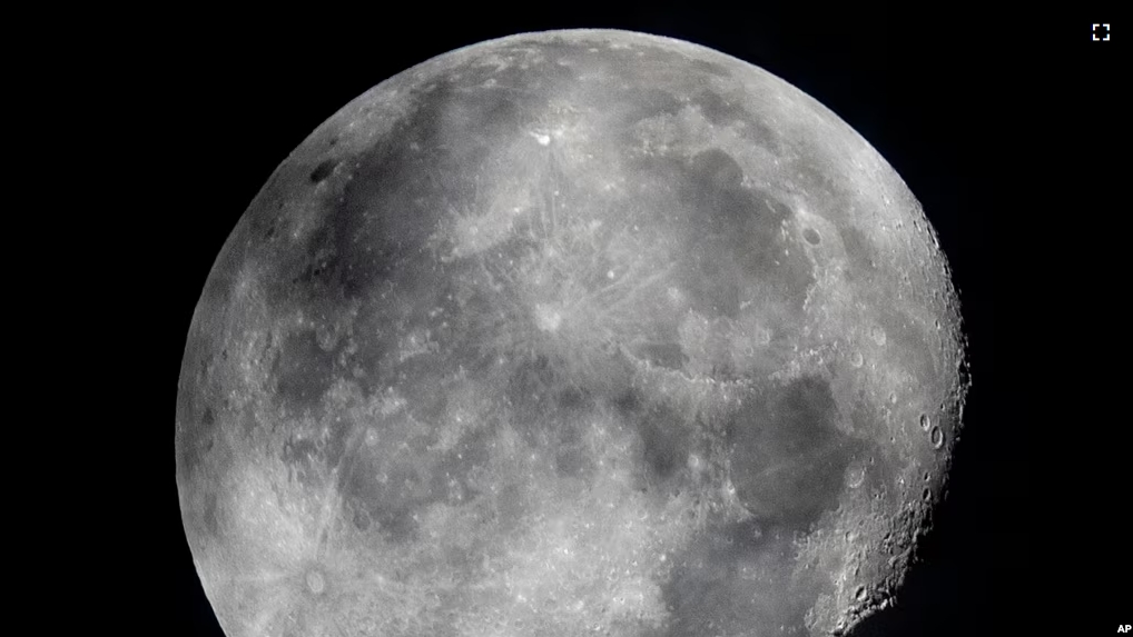 In this early Monday, Oct. 5, 2020, file photo, a waning moon is seen at the sky over Frankfurt, Germany. (AP Photo/Michael Probst, File)