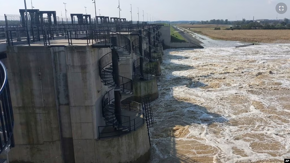 This photo provided by the state company Polish Waters shows the Oder River flood waters channeled into the newly-built Lower Raciborz Reservoir in Raciborz, southwestern Poland, Sept. 23, 2024. (Polish Waters via AP)