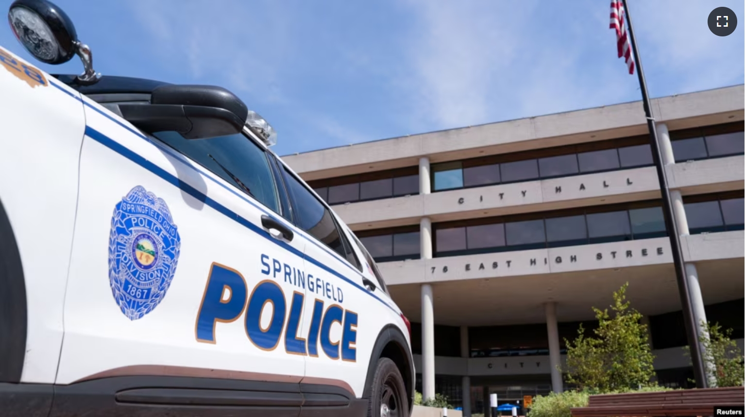 FILE - A police car sits outside Ohio City Hall which received a bomb threat on Thursday morning, in Springfield, Ohio, U.S., September 12, 2024. (REUTERS/Julio-Cesar Chavez)