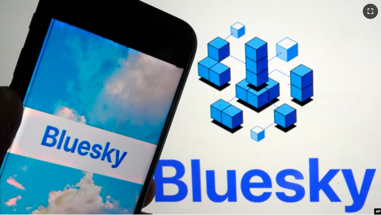 In this file photo, the app for Bluesky is shown on a mobile phone, left, and on a laptop screen on June 2, 2023, in New York. (AP Photo/Richard Drew, File)