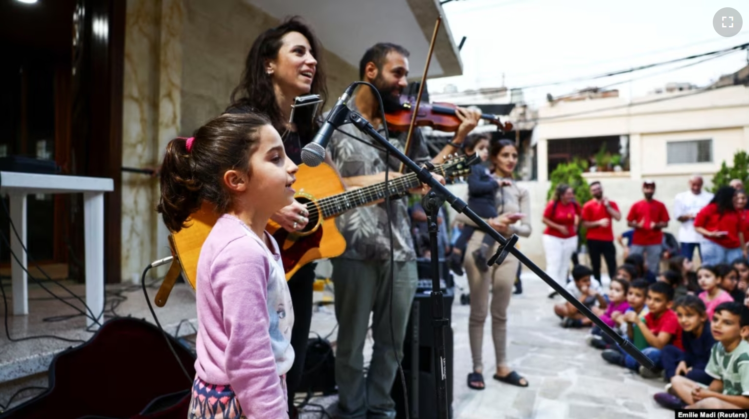 Displaced and refugee children attend an event where Lebanese singer Joy Fayad and musician Oliver Maalouf perform, amid the ongoing hostilities between Hezbollah and Israeli forces, in Dbayeh, Lebanon November 9, 2024. (REUTERS/Emilie Madi)