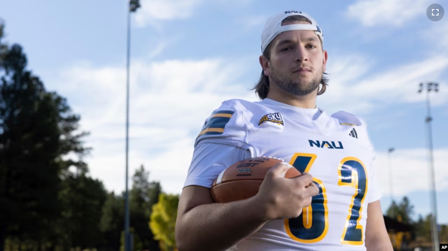 Northern Arizona University's Jonny Bottorff poses for a photo on campus on Monday, Oct. 28, 2024, in Flagstaff, Ariz. (AP Photo/Josh Biggs)