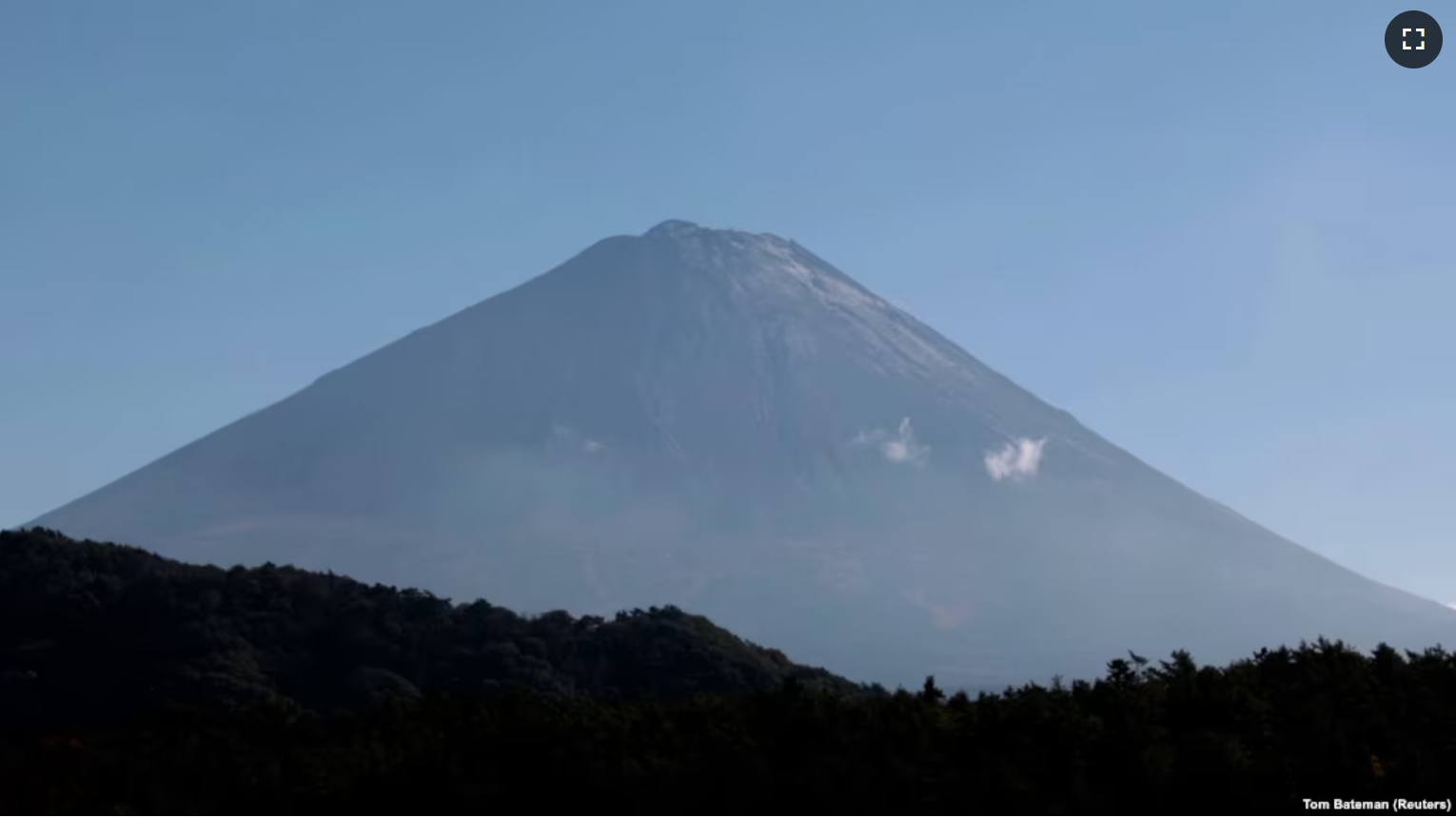 Peak of Mount Fuji showing snow as seen from Fujikawaguchiko, Yamanashi Prefecture, Japan. November 7, 2024. (Tom Bateman/REUTERS)