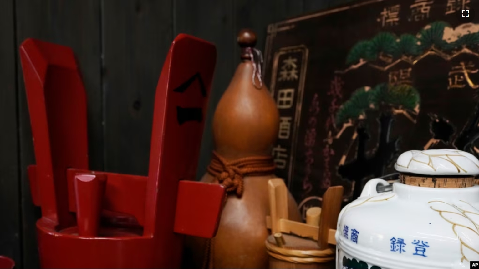 Traditional containers to keep Japanese sake are placed for decorations at a room shown during a media tour at the Ozawa Sake Brewery in Ome, on the western outskirts of Tokyo, Japan, Wednesday, Nov. 13, 2024. (AP Photo/Hiro Komae)