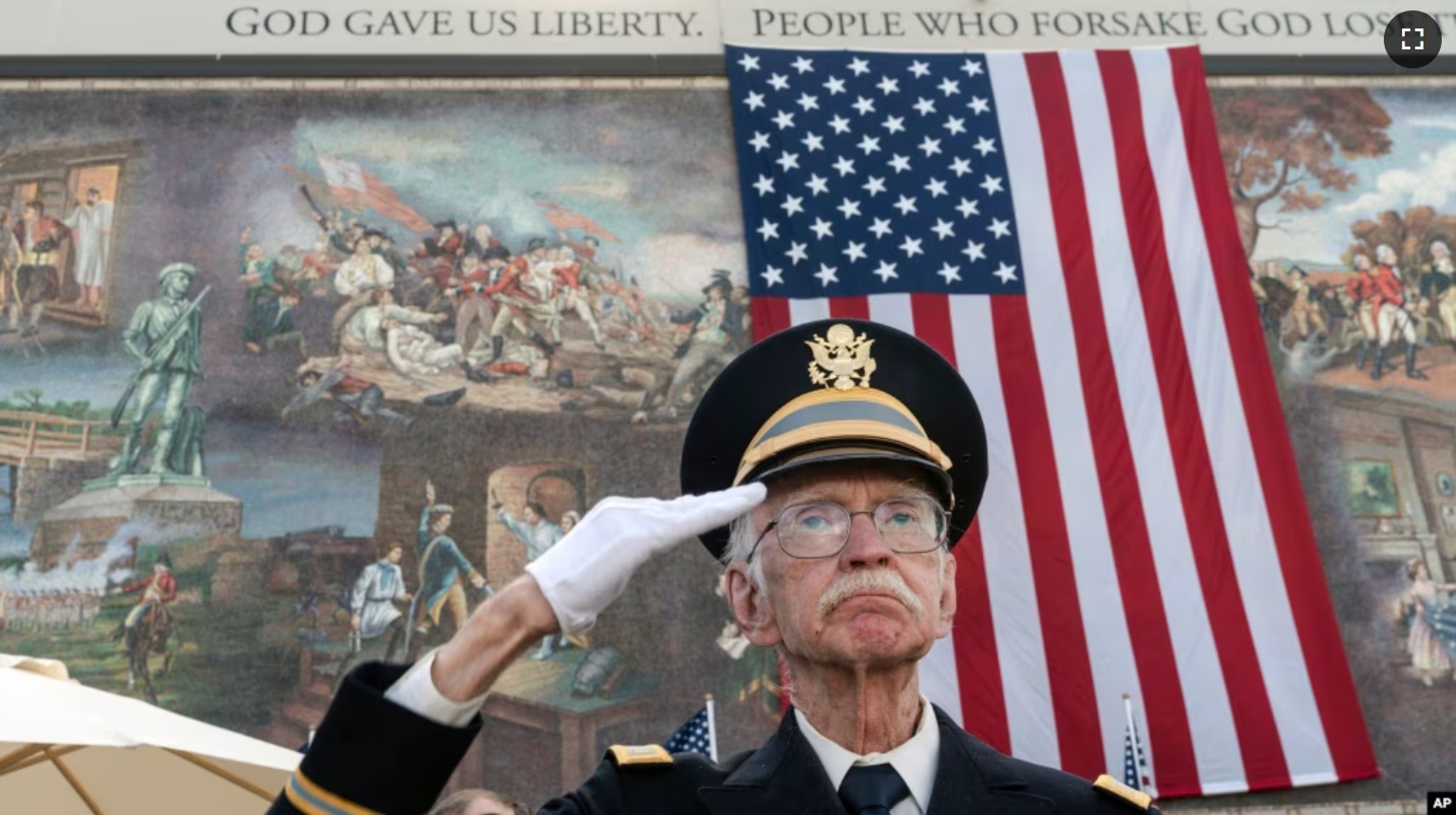 FILE - U.S. Army veteran 2nd Lt. Allen Brandstater salutes during a Veterans Day observance in Los Angeles on Nov. 11, 2022. (AP Photo/Damian Dovarganes)