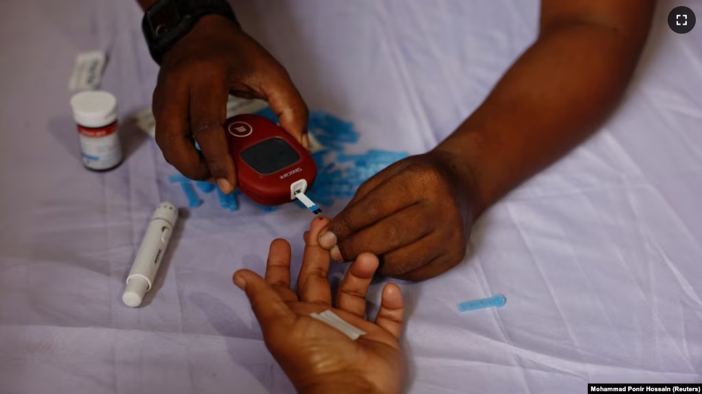 A person receives a blood sugar test for diabetes in Dhaka, Bangladesh on November 14, 2024. (REUTERS/Mohammad Ponir Hossain)