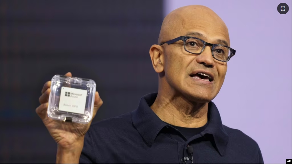 Microsoft CEO Satya Nadella introduces the Azure Boost DPU at the company's Ignite conference Tuesday, Nov. 19, 2024, in Chicago. (AP Photo/Charles Rex Arbogast)