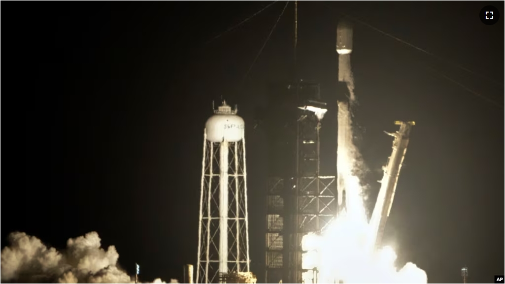 A SpaceX Falcon 9 rocket lifts off from pad 39A with a payload of a pair of lunar landers at the Kennedy Space Center in Cape Canaveral, Fla., Wednesday, Jan. 15, 2025. (AP Photo/John Raoux)