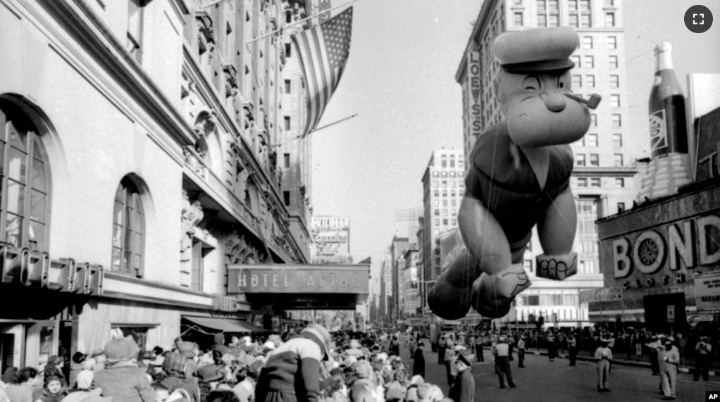 FILE - A helium-filled Popeye balloon appears in the 33rd Macy's Thanksgiving Day Parade in New York on Nov. 26, 1959. (AP Photo/File)