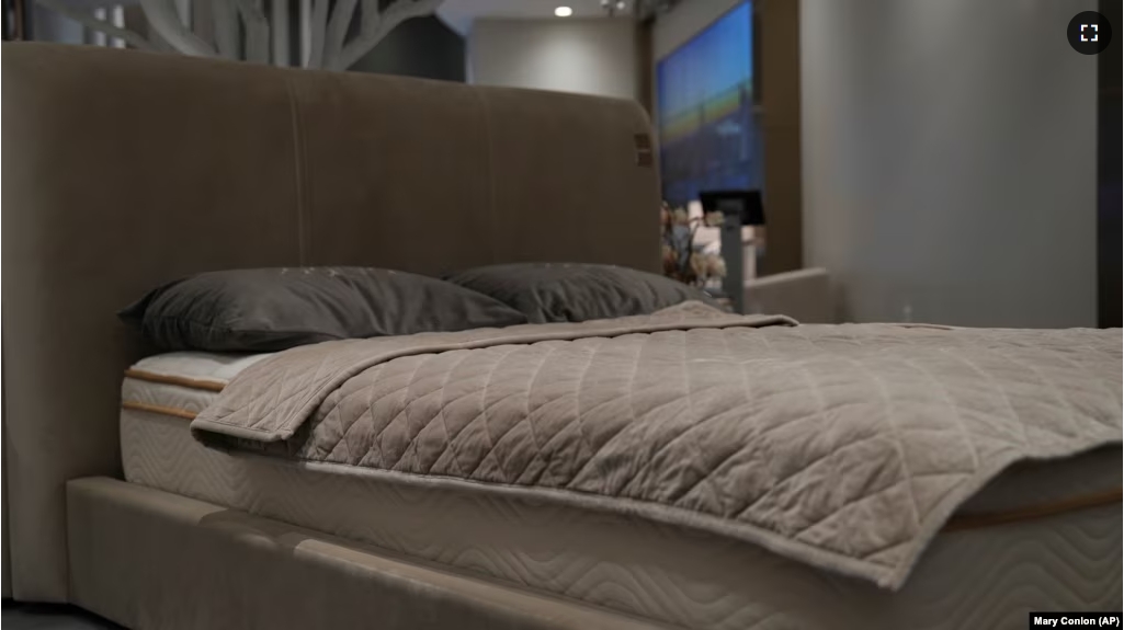 Weighted blankets are on display in a mattress sales showroom in New York City, New York, Dec. 4, 2024. (AP Photo/Mary Conlon)