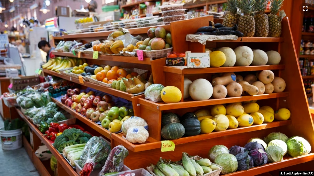 In this April 24, 2014 file photo, a variety of healthy fruits and vegetables are displayed for sale at a market in Washington. (AP Photo/J. Scott Applewhite, File)