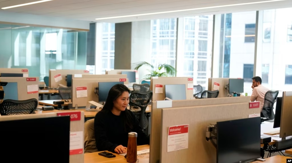 People work at the Yelp office in San Francisco on February, 14, 2023. (AP Photo/Jeff Chiu, File)
