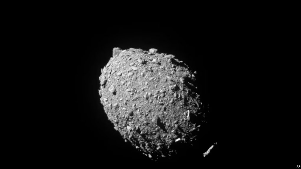 This image provided by NASA shows the asteroid Dimorphos, captured by NASA’s DART mission just two seconds before the spacecraft struck its surface, on Sept. 26, 2022. (NASA/Johns Hopkins APL via AP)