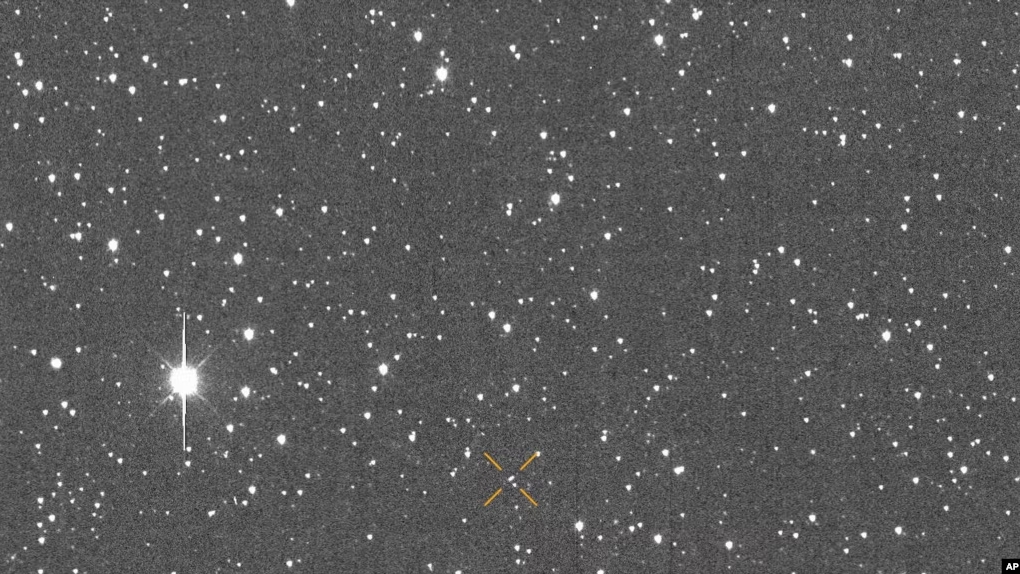 This image made available by University of Hawaii's asteroid impact alert system shows the motion of asteroid 2024 YR4 over about one hour, Dec. 27, 2024. (ATLAS / University of Hawaii / NASA via AP